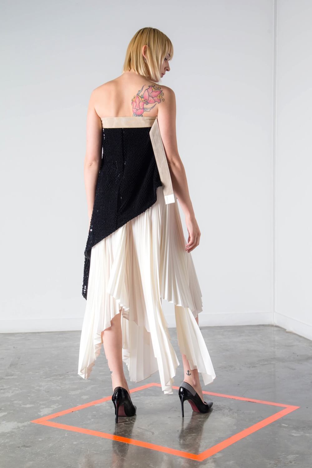 ASYMMETRIC SEQUIN STRAPLESS TOP